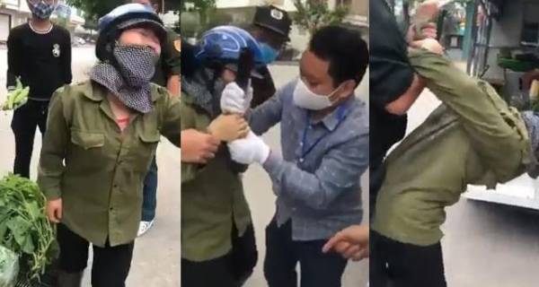 Bị bắt đưa xe chở rau về phường, người phụ nữ la khóc kháng cự