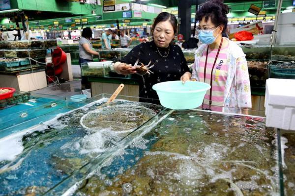 Các cụm dịch mới ơ Trung Quốc liên quan bí ẩn tới chợ hải sản