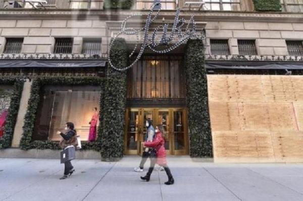 Lo biểu tình thành sau bầu cử, các cửa hàng Mỹ lắp ván gỗ “phòng thân”