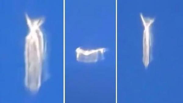 Airplane Passenger Filmed An Unusual Shape Shifting UFO Or A Mysterious Creature?