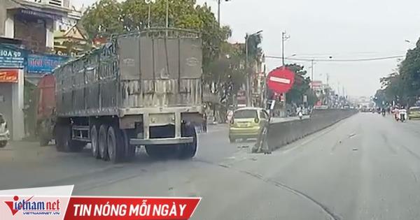 Xe tải lao sang đường ngược chiều cứu ô tô con qua đường ẩu ở Thanh Hóa