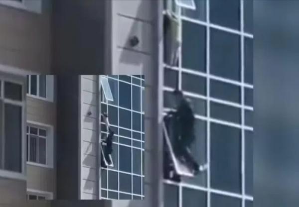 Kazakhstan: “Thót tim” người đàn ông liều mạng cứu bé gái sắp rơi từ cửa sổ tầng 8