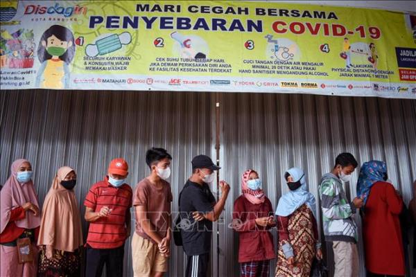 Indonesia lạc quan chuyển đại dịch COVID-19 sang giai đoạn bệnh đặc hữu